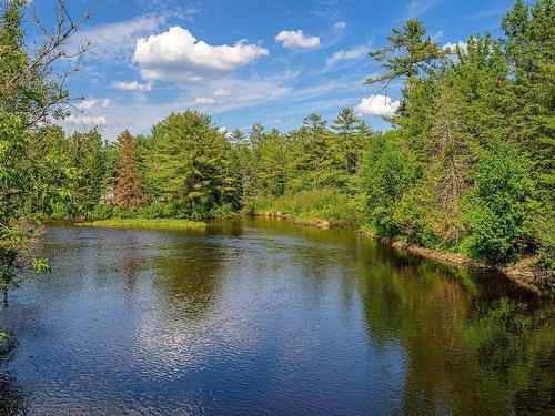 Waterfront - 500 Rue Des Rosiers, Sainte-Adèle, QC - Outdoor With Body Of Water With View