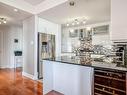 Kitchen - 302-800 Boul. Lucille-Teasdale, Terrebonne (Lachenaie), QC  - Indoor Photo Showing Kitchen With Upgraded Kitchen 