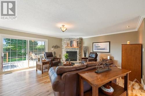 2586 Wilhaven Drive, Cumberland, ON - Indoor Photo Showing Living Room With Fireplace