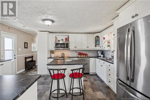 32 Moise, Rogersville, NB - Indoor Photo Showing Kitchen With Double Sink