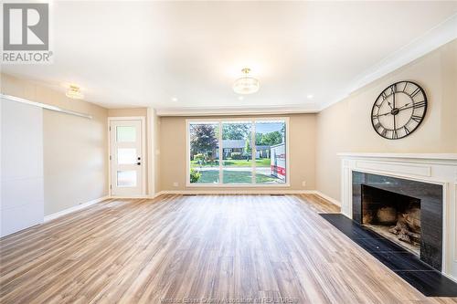 720 Cartier Drive, Windsor, ON - Indoor Photo Showing Living Room With Fireplace