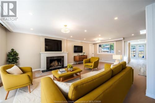 720 Cartier Drive, Windsor, ON - Indoor Photo Showing Living Room With Fireplace