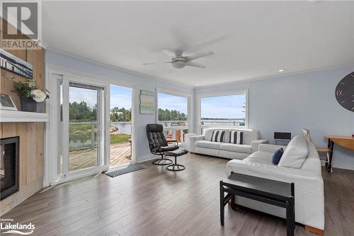 64 Wolverine Beach Road, Port Severn, ON - Indoor Photo Showing Living Room With Fireplace