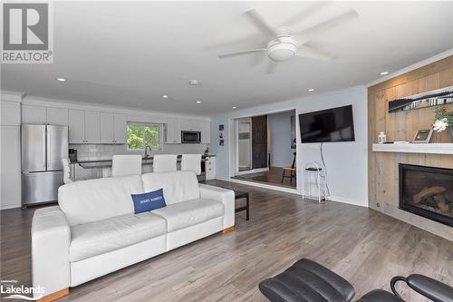 64 Wolverine Beach Road, Port Severn, ON - Indoor Photo Showing Living Room With Fireplace