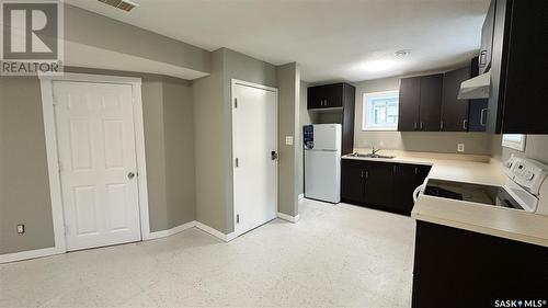 A And B 2200 Harvey Street, Regina, SK - Indoor Photo Showing Kitchen With Double Sink