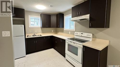 A And B 2200 Harvey Street, Regina, SK - Indoor Photo Showing Kitchen With Double Sink