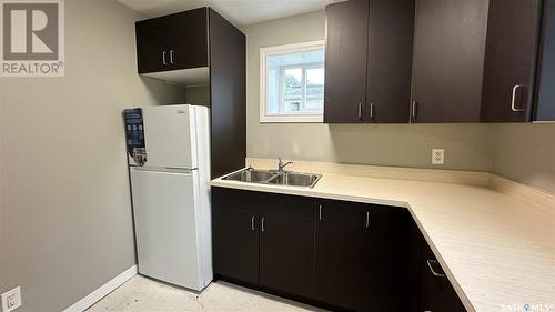 A And B 2200 Harvey Street, Regina, SK - Indoor Photo Showing Kitchen With Double Sink