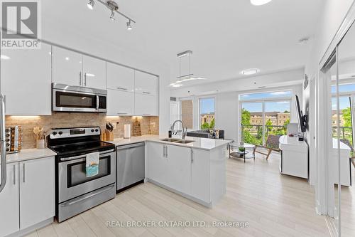 325 - 28 Prince Regent Street, Markham, ON - Indoor Photo Showing Kitchen With Stainless Steel Kitchen With Double Sink With Upgraded Kitchen