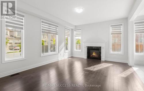 1554 Devine Point, Milton (Ford), ON - Indoor Photo Showing Living Room With Fireplace