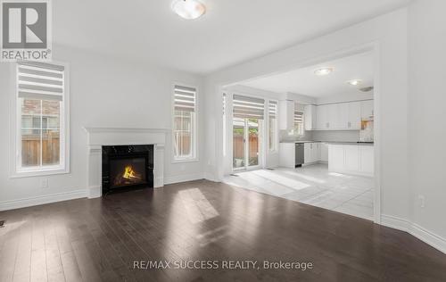 1554 Devine Point, Milton (Ford), ON - Indoor Photo Showing Living Room With Fireplace