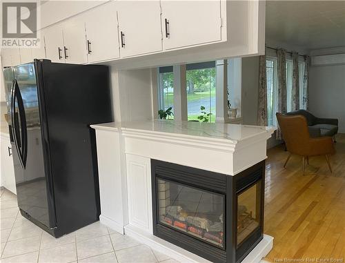 27 Hill Street, St. Stephen, NB - Indoor Photo Showing Living Room With Fireplace