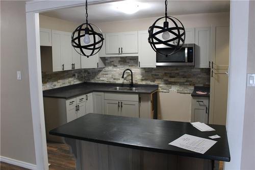 583 Mornington Avenue|Unit #110, London, ON - Indoor Photo Showing Kitchen With Double Sink