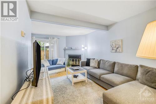 1602 Cheevers Crescent, Ottawa, ON - Indoor Photo Showing Living Room With Fireplace