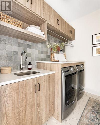 This home has not been built yet. Images shown are to showcase builder finishes - 515 Reflection Street, Ottawa, ON - Indoor Photo Showing Laundry Room