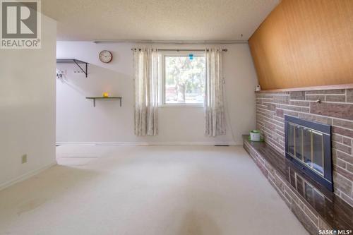 414 T Avenue N, Saskatoon, SK - Indoor With Fireplace