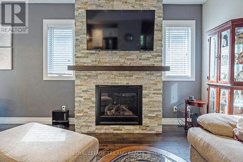 37 - 9 Dausett Drive, Middlesex Centre (Komoka), ON - Indoor Photo Showing Living Room With Fireplace