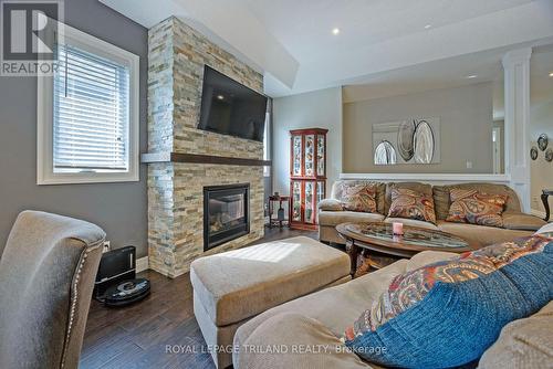 37 - 9 Dausett Drive, Middlesex Centre (Komoka), ON - Indoor Photo Showing Living Room With Fireplace