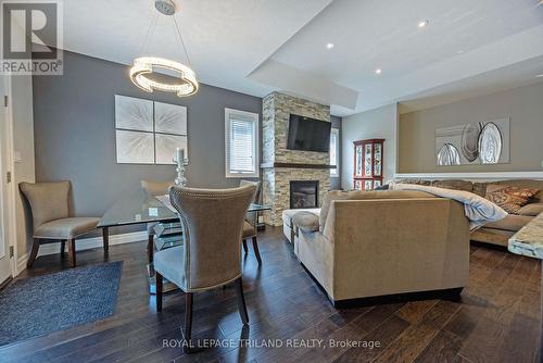 37 - 9 Dausett Drive, Middlesex Centre (Komoka), ON - Indoor Photo Showing Living Room With Fireplace