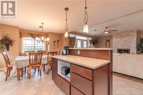 759 Route 933, Haute-Aboujagane, NB - Indoor Photo Showing Dining Room With Fireplace