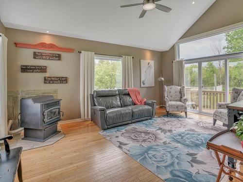 Salon - 80 Rue Maisonneuve, Val-Des-Monts, QC - Indoor Photo Showing Living Room With Fireplace