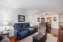 201-1329 Klo Road, Kelowna, BC  - Indoor Photo Showing Living Room 