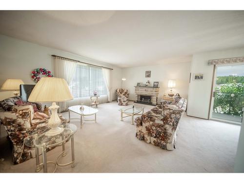 721 23A Avenue N, Cranbrook, BC - Indoor Photo Showing Living Room With Fireplace