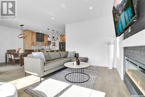 4154 Fieldstone Way, Regina, SK - Indoor Photo Showing Living Room With Fireplace