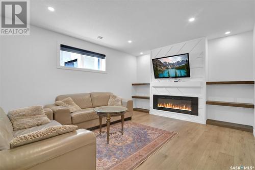 4154 Fieldstone Way, Regina, SK - Indoor Photo Showing Living Room With Fireplace