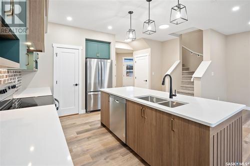 320 Myles Heidt Lane, Saskatoon, SK - Indoor Photo Showing Kitchen With Stainless Steel Kitchen With Double Sink With Upgraded Kitchen