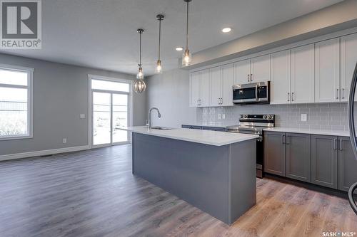 320 Myles Heidt Lane, Saskatoon, SK - Indoor Photo Showing Kitchen With Upgraded Kitchen