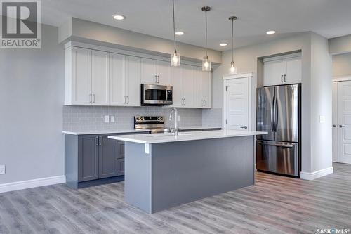 320 Myles Heidt Lane, Saskatoon, SK - Indoor Photo Showing Kitchen With Stainless Steel Kitchen With Upgraded Kitchen