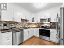 330 4 Avenue Se Unit# 304, Salmon Arm, BC  - Indoor Photo Showing Kitchen With Stainless Steel Kitchen With Upgraded Kitchen 