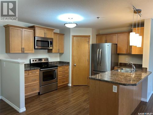 109 1621 Dakota Drive, Regina, SK - Indoor Photo Showing Kitchen With Stainless Steel Kitchen With Double Sink