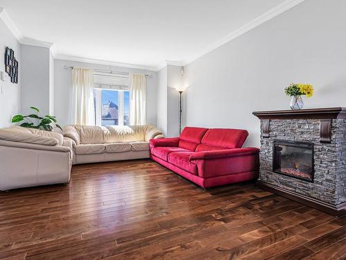 Living room - 161 Rue Des Abbesses, Vaudreuil-Dorion, QC - Indoor Photo Showing Living Room With Fireplace