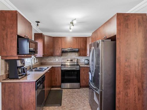 Kitchen - 161 Rue Des Abbesses, Vaudreuil-Dorion, QC - Indoor Photo Showing Kitchen With Double Sink