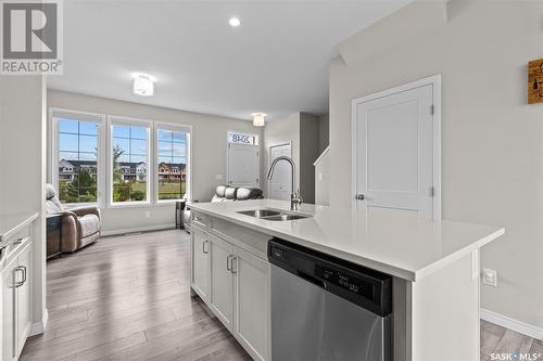 2048 Brighton Common, Saskatoon, SK - Indoor Photo Showing Kitchen With Double Sink