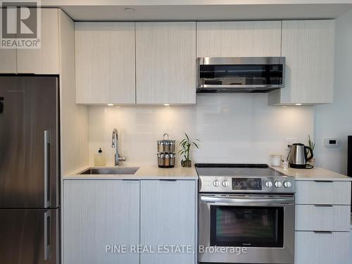 0912 - 25 Richmond Street E, Toronto, ON - Indoor Photo Showing Kitchen With Upgraded Kitchen