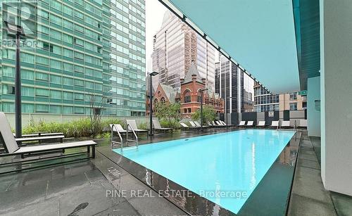 0912 - 25 Richmond Street E, Toronto, ON - Outdoor With In Ground Pool With Facade