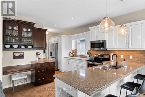 49 Maplehurst Crescent, Prince Edward County (Wellington), ON - Indoor Photo Showing Kitchen With Double Sink With Upgraded Kitchen