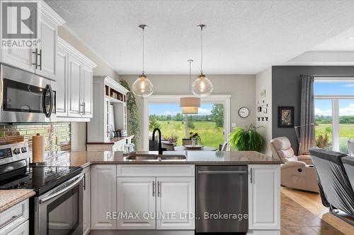 49 Maplehurst Crescent, Prince Edward County (Wellington), ON - Indoor Photo Showing Kitchen With Double Sink