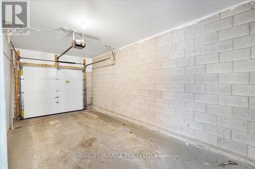 455 Comiskey Crescent, Mississauga (Meadowvale Village), ON - Indoor Photo Showing Garage