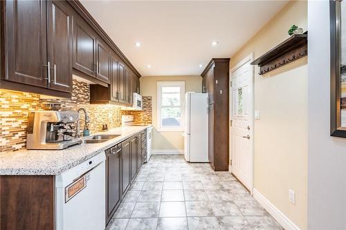 28 East 27Th Street, Hamilton, ON - Indoor Photo Showing Kitchen With Double Sink