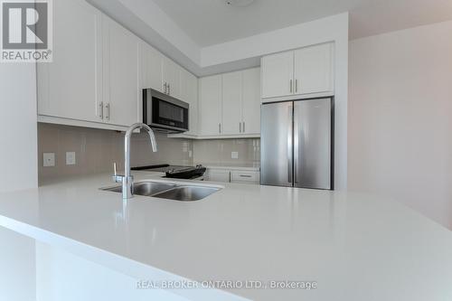 1005 - 470 Dundas Street, Hamilton (Waterdown), ON - Indoor Photo Showing Kitchen With Stainless Steel Kitchen With Double Sink