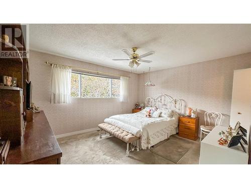 1225 Mountain Avenue, Kelowna, BC - Indoor Photo Showing Bedroom