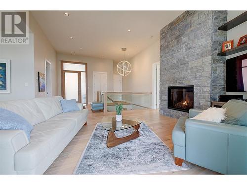 3316 Black Pine Lane, Kelowna, BC - Indoor Photo Showing Living Room With Fireplace