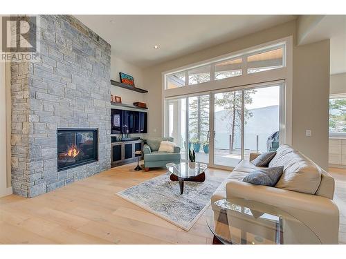 3316 Black Pine Lane, Kelowna, BC - Indoor Photo Showing Living Room With Fireplace