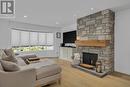 475 Eldorado Road, Kelowna, BC  - Indoor Photo Showing Living Room With Fireplace 