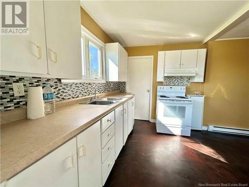 2971 Morais Street, Bas-Caraquet, NB - Indoor Photo Showing Kitchen With Double Sink