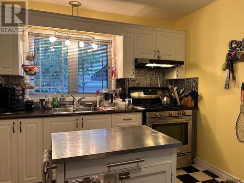 65 Byng Ave, Kapuskasing, ON - Indoor Photo Showing Kitchen With Double Sink