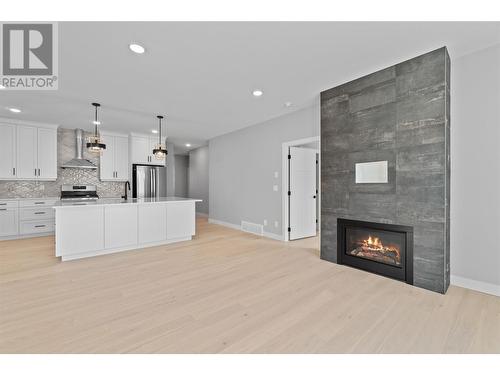 1840 10 Street Sw Unit# 16, Salmon Arm, BC - Indoor Photo Showing Other Room With Fireplace